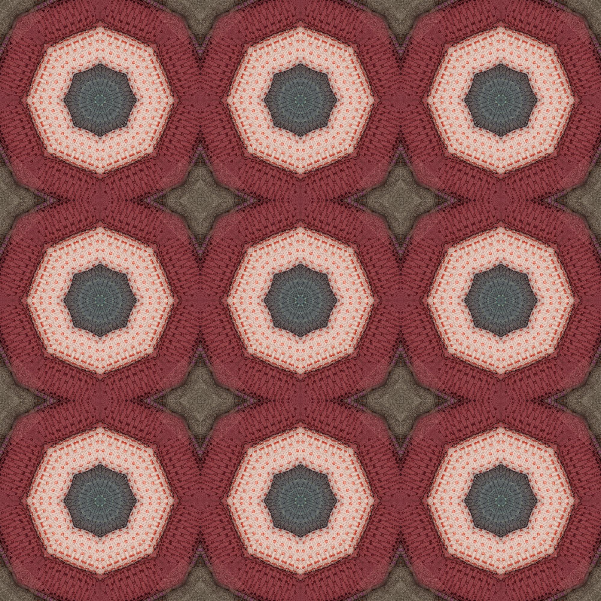 Piccolo cuscino con ricamo geometrico